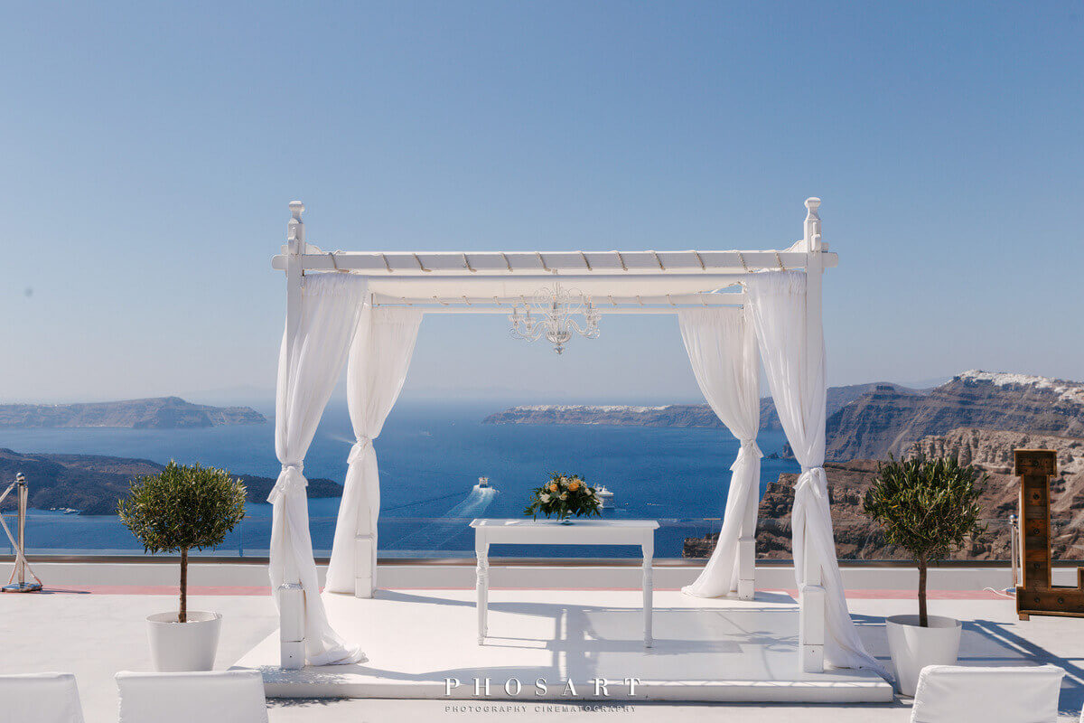 Gazebo draped in white fabric at luxury private estate wedding venue in santorini